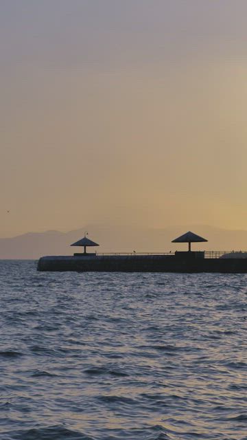 Boardwalk with umbrellas.