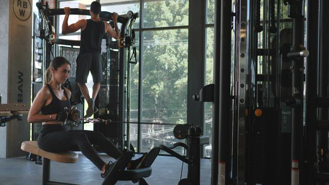 Two people working out.