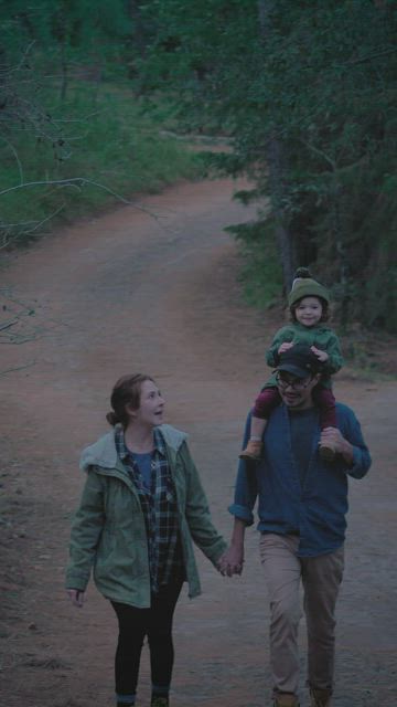 Family walking together in nature.