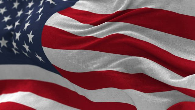 American flag waving in slow motion closeup.